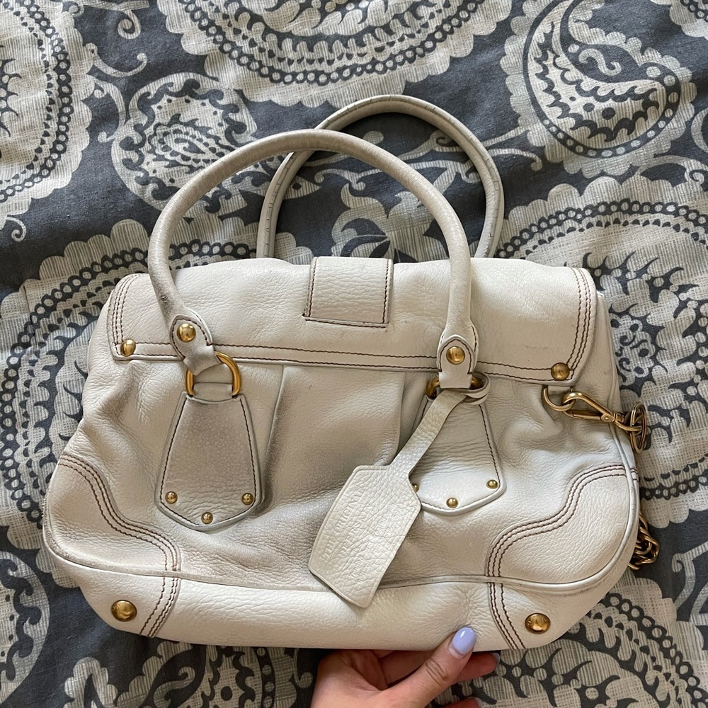 Beige and gold Prada bag